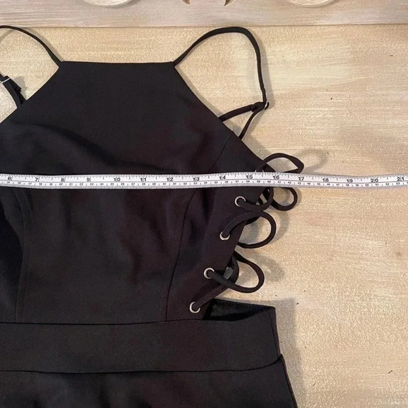 Dress with lace up detail on sides. Zipper in back. - Picture 9 of 12